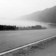 The early morning mist rises up in Winchester Road, near Pack Lane, in 1960