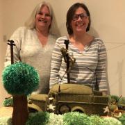 Jenny Shepperd (right) and Diana Peacock (left) with one of the creations