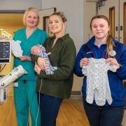 packs of premature baby clothes given to parents
