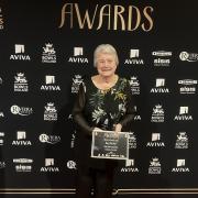 Oakley Bowling Club’s Kay Kerley with her award