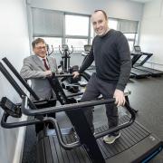 Cabinet member for sports, leisure and culture Cllr Kerry Morrow (on treadmill) with Everest Community Academy’s sports director Roland Davey