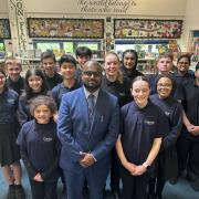 Headteacher Harry Kutty with students at Cantell School