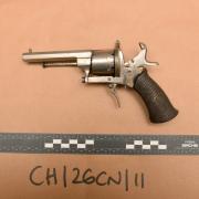 Three revolvers were found in the raid
