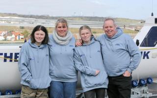 Andy Warney (right) with his wife Alison (second from left) and daughters Siobhan (left) and Shamara
