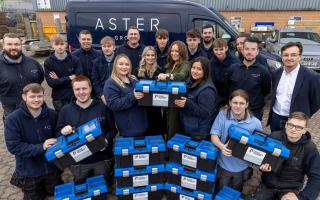 Aster apprentices with their toolbox donations