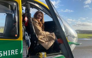 Fortem Financial Management director Shannon Liddiard at Hampshire and Isle of Wight Air Ambulance's base in Thruxton