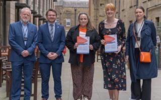 Phoebe Day (middle) with other MS Society campaigners