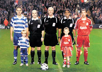 Basingstoke Gazette: Joel Bagan (in Reading kit) on the Anfield pitch before kick-off in the 2007 game