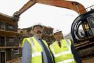 Cllr Cathy Osselton starts the work, with David Cobb, contracts manager for Mansell Partnership Housing (front left) and Martin Nurse, chief executive for Sentinel Housing Association